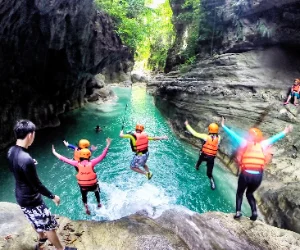 Kawasan Falls Cebu canyoneering tour — cliff jumping and rappelling through the scenic cliffs of Badian with Kawasan Falls as the finale