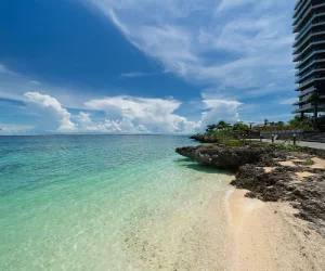 The Reef Island Resort Mactan Cebu — iconic cascading reef plate architecture hotel near Mactan Cebu International Airport with private beach and sea views