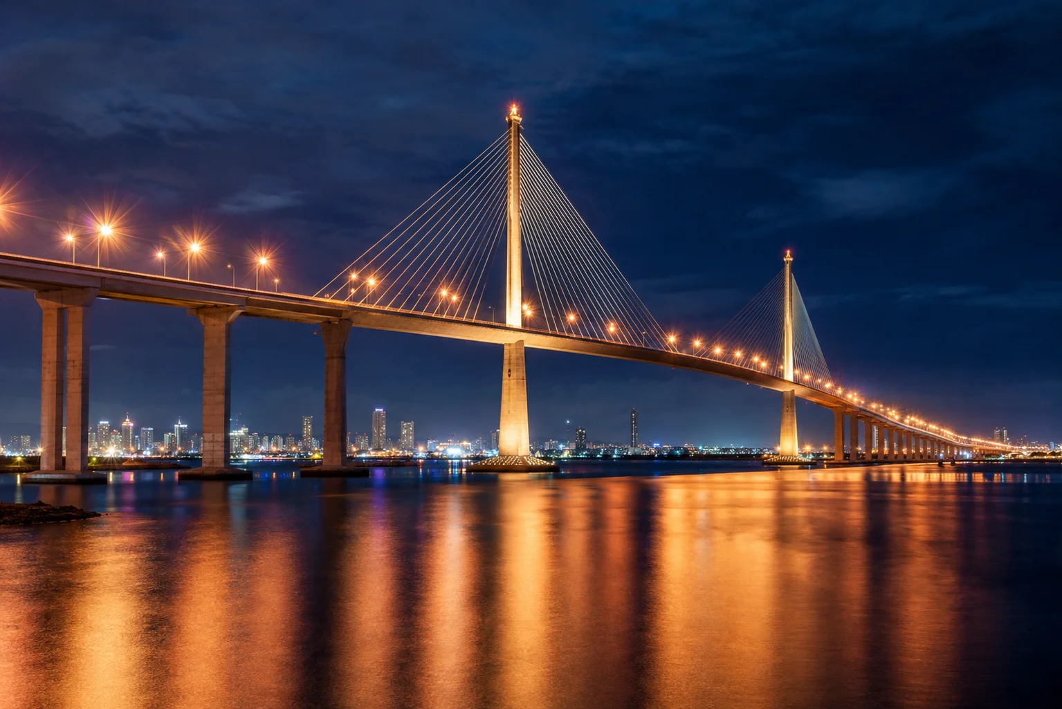 Cebu Philippines Travel Guide 2026: Tourist Spots, Beaches & Tips 10 CCLEX bridge Cebu Philippines at night — illuminated cable-stayed bridge connecting Cebu City to Mactan Island