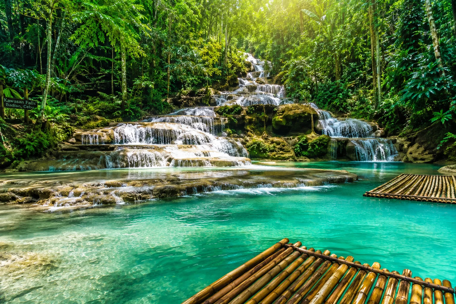 Cebu Philippines Travel Guide 2026: Tourist Spots, Beaches & Tips 12 Kawasan Falls Badian Cebu Philippines — multi-tiered turquoise waterfall surrounded by jungle, canyoneering destination