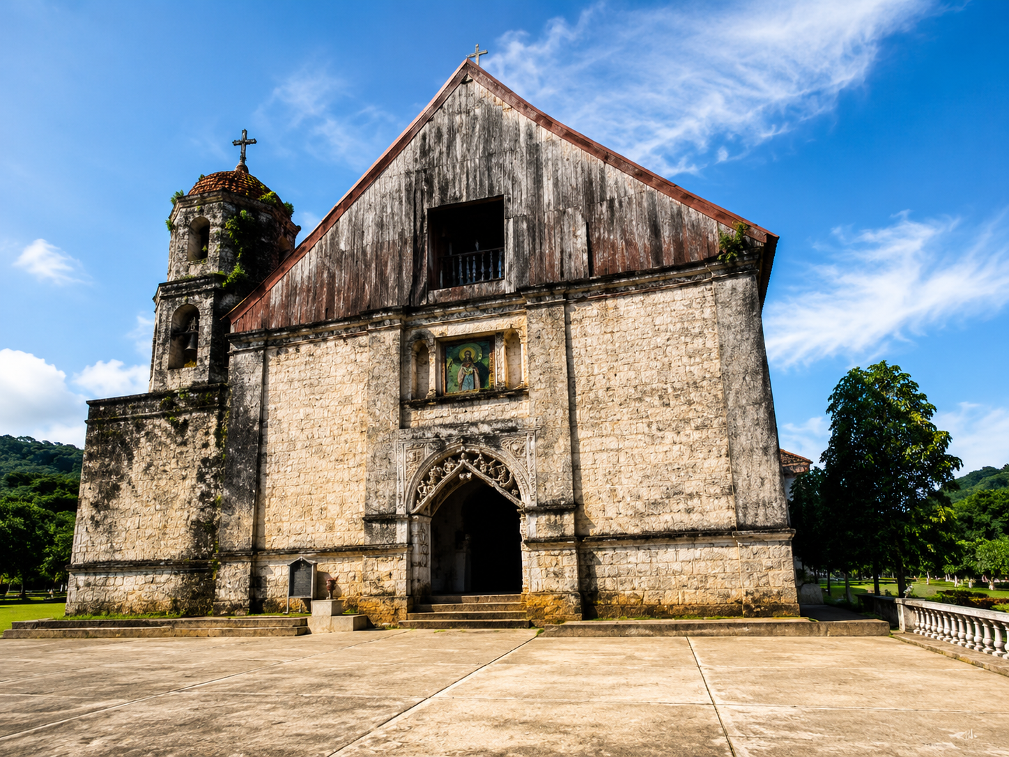 Lazi Church facade in Siquijor Philippines — the oldest and largest Spanish colonial stone church on the island, completed in 1884 with its iconic bell tower