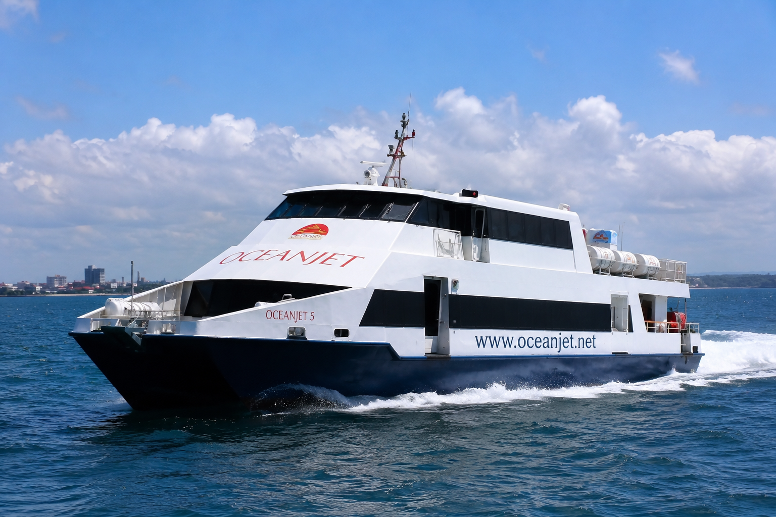 OceanJet fastcraft vessel at sea on the Cebu to Siquijor route via Tagbilaran Bohol — air-conditioned fast ferry with assigned seating Philippines