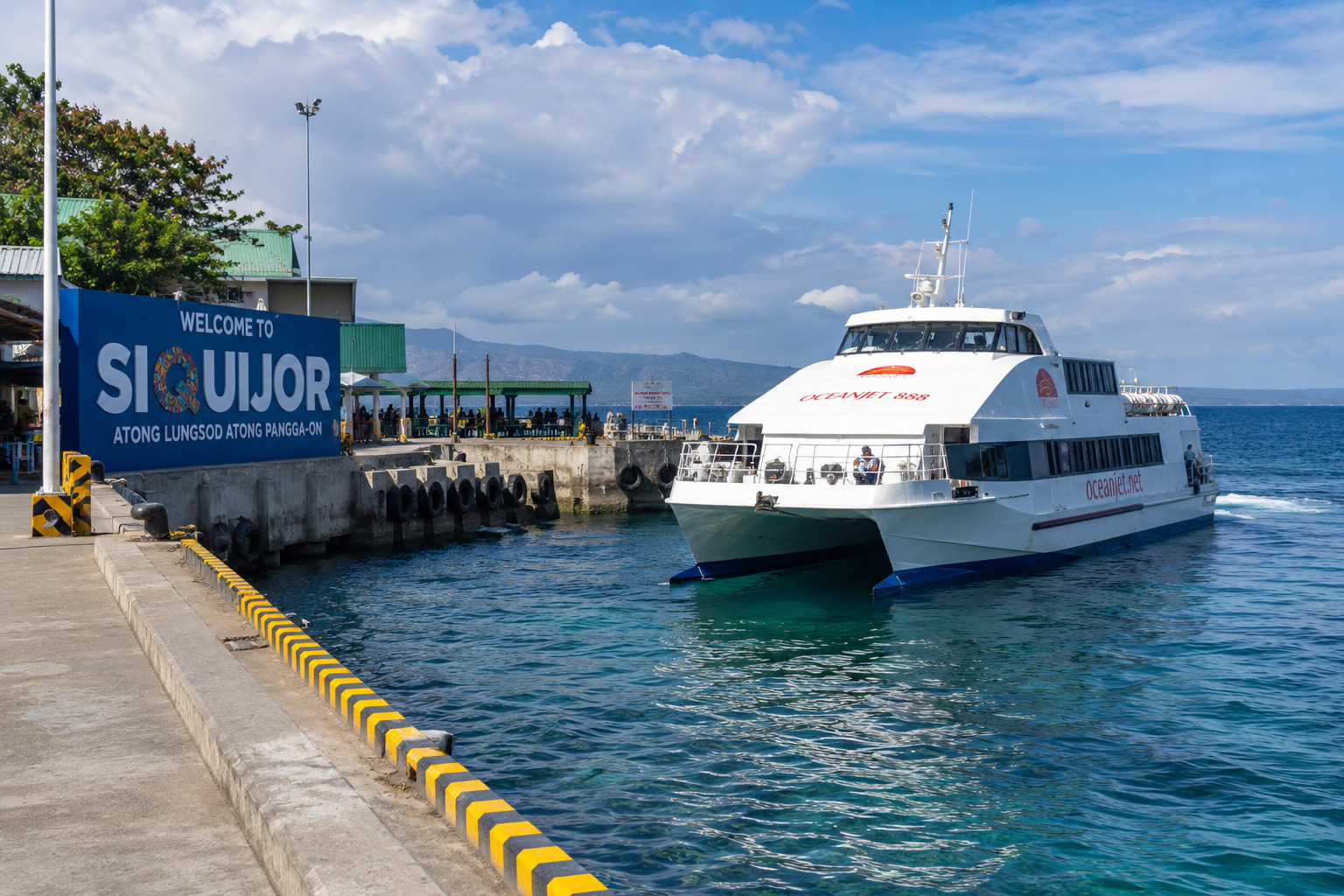 Fast ferry arriving at Siquijor pier from Dumaguete — the most popular way to get to Siquijor island Philippines