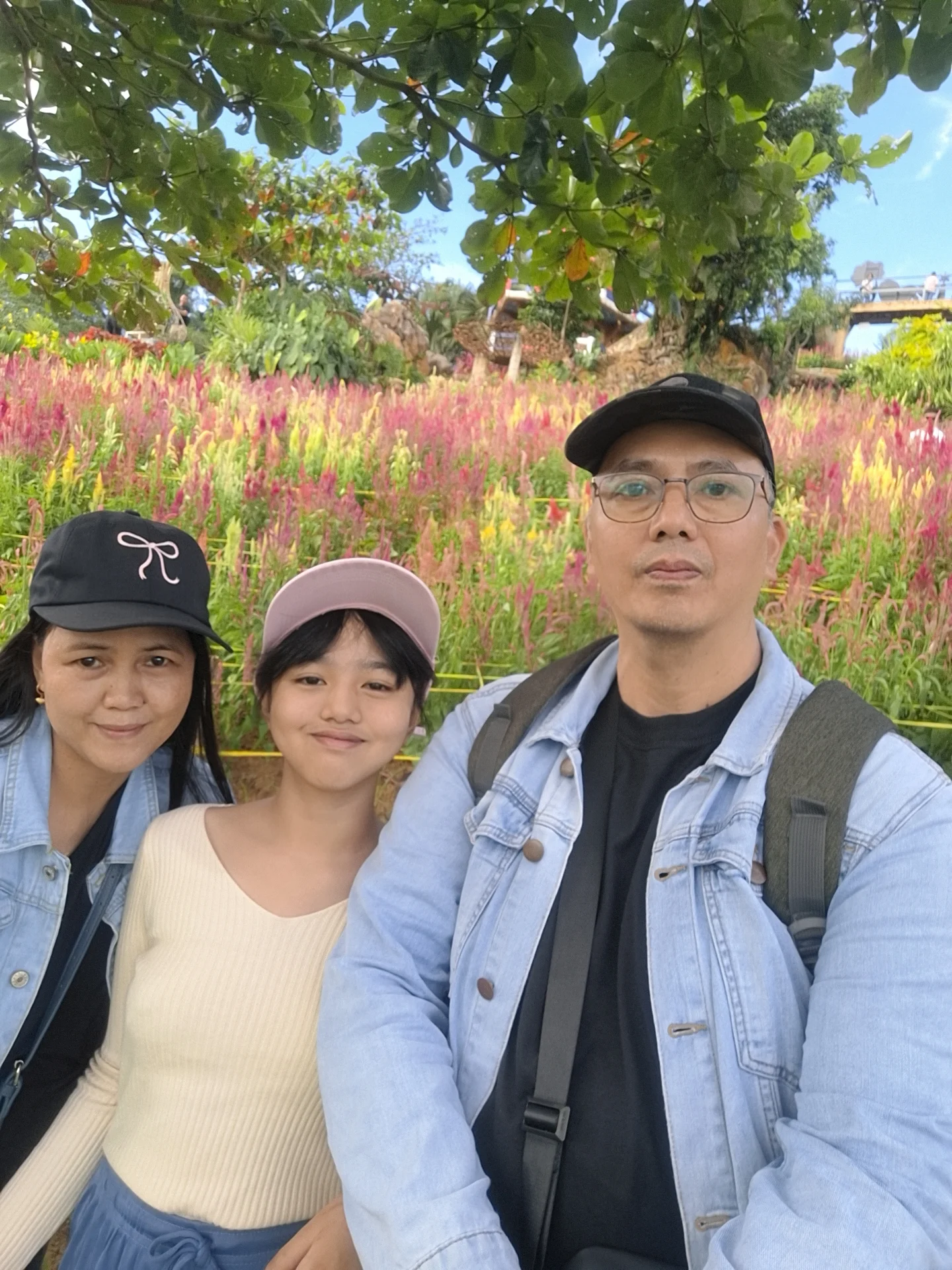Sirao Flower Garden Cebu — terraced hillside fields of vibrant celosia flowers in red, orange and pink, the Little Amsterdam of Cebu
