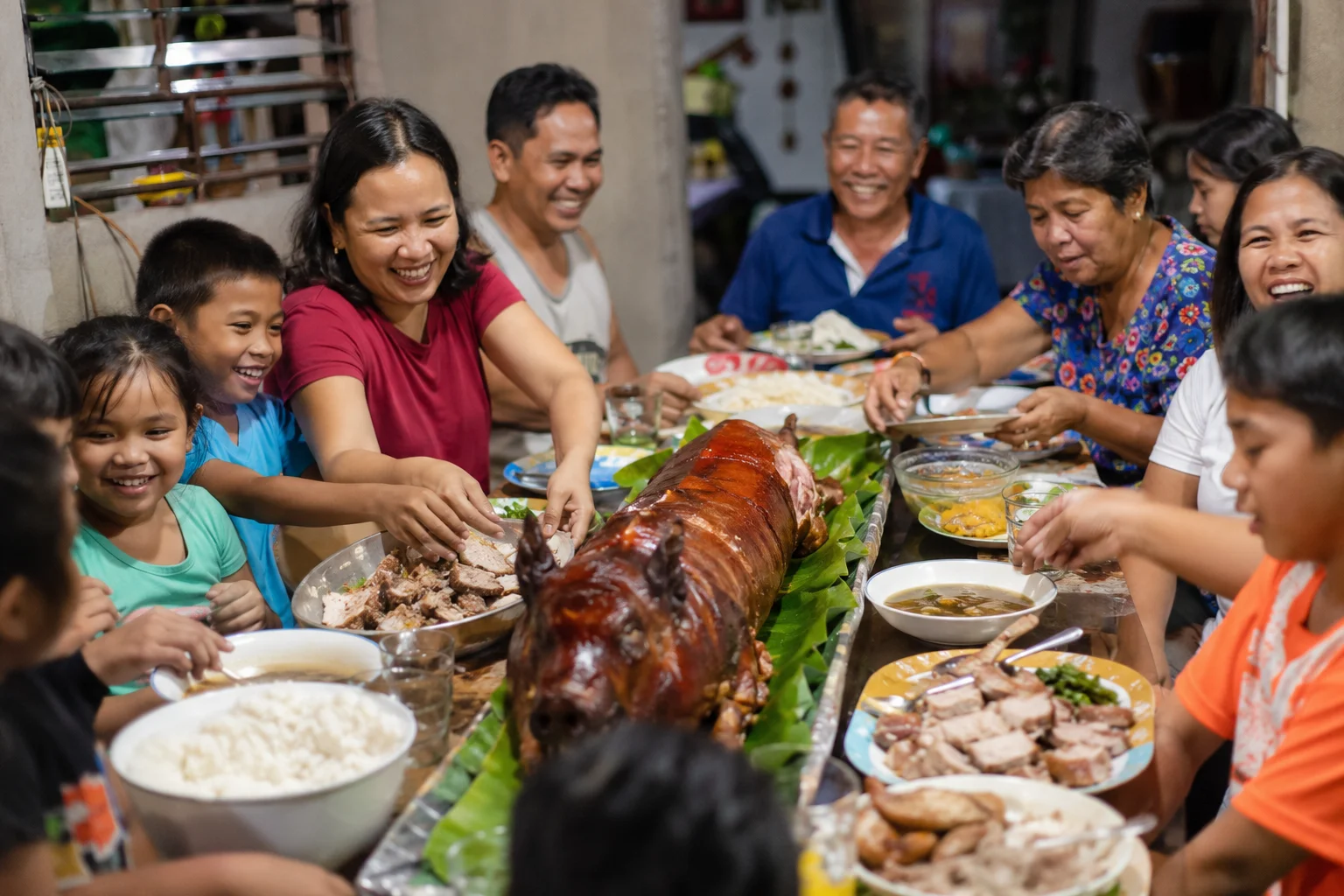 Family lechon feast at a Filipino celebration in Cebu
