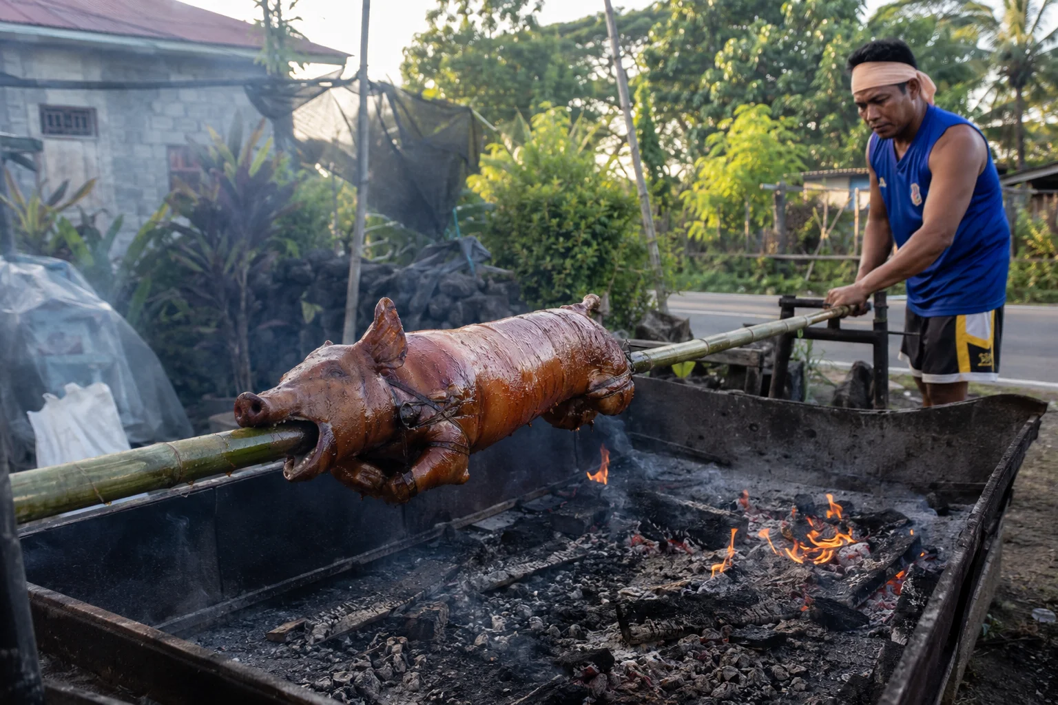 Traditional charcoal spit-roasting method for Cebu lechon