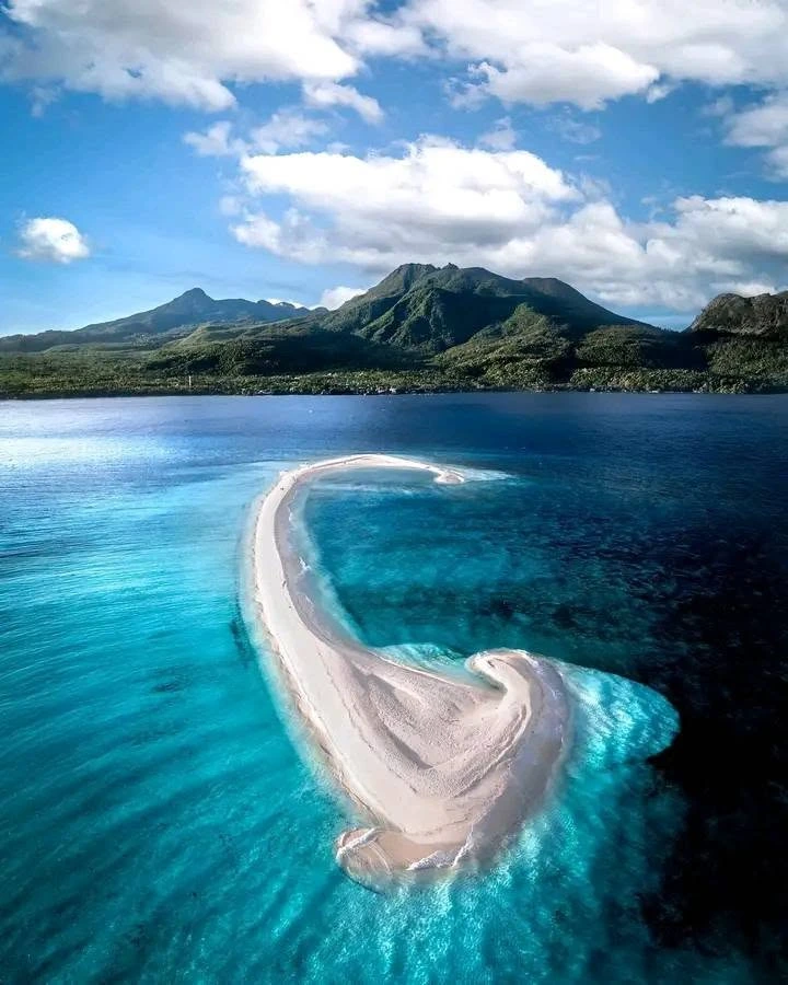 10 Romantic Getaways in the Philippines (2026): Best Honeymoon Spots for Couples 18 White Island sandbar with Mount Hibok-Hibok in Camiguin